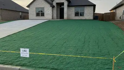 Fresh hydroseed application with full soil coverage by Chop Chop Landscaping in Oklahoma City, OK